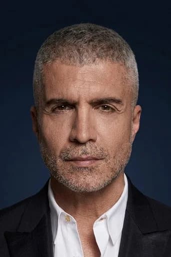 Özcan Deniz as Seymen Karadağ in The Mansion With Vines